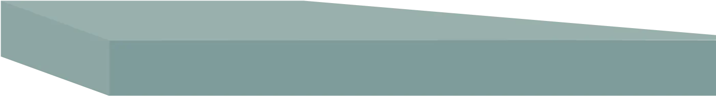 Close-up view of light bluish rectangular bricks arranged in a staggered pattern.
